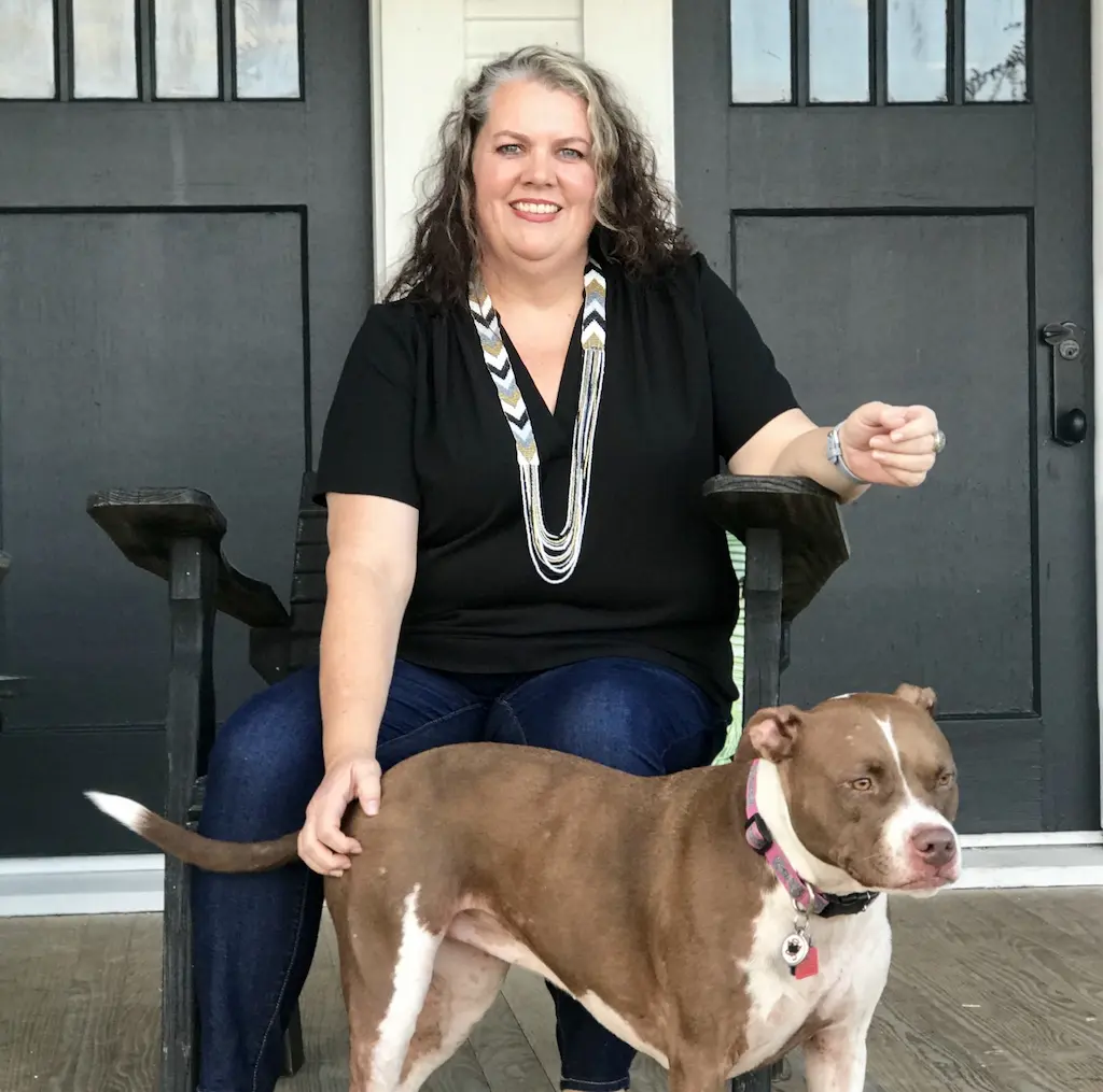 Photo of Robin Barry and a dog